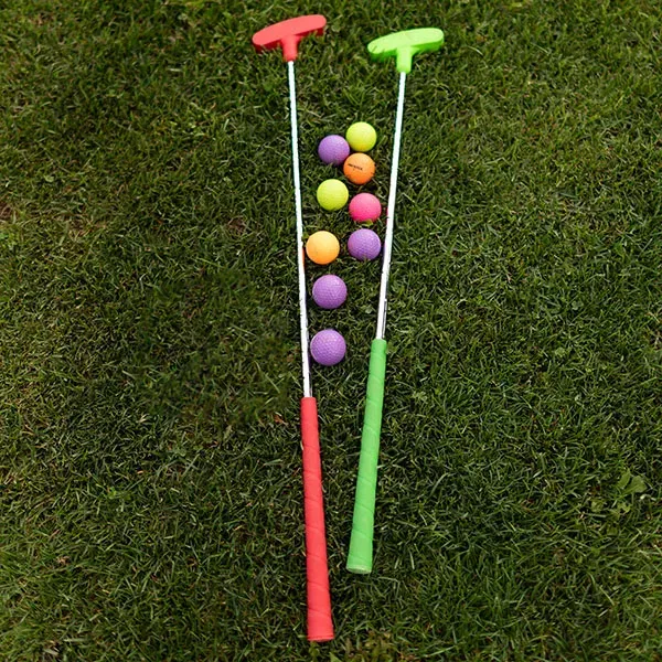 Putters and balls from the mini golf course at Market Sports.