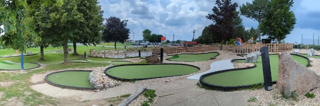 A mini golf hole at Market Sports with landscaping.