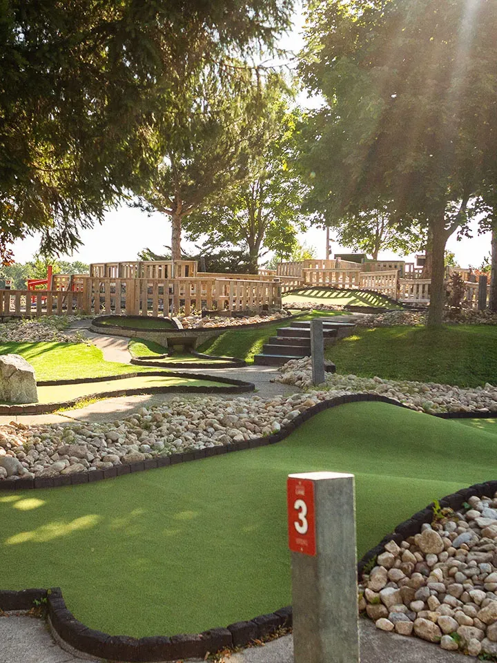 A mini golf hole at Market Sports with rocks and obstacles.